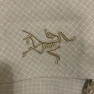 Arc'teryx Beige Hooded Jacket with Zippered Pockets